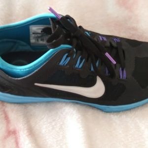 Blue-purple and black nike shoes